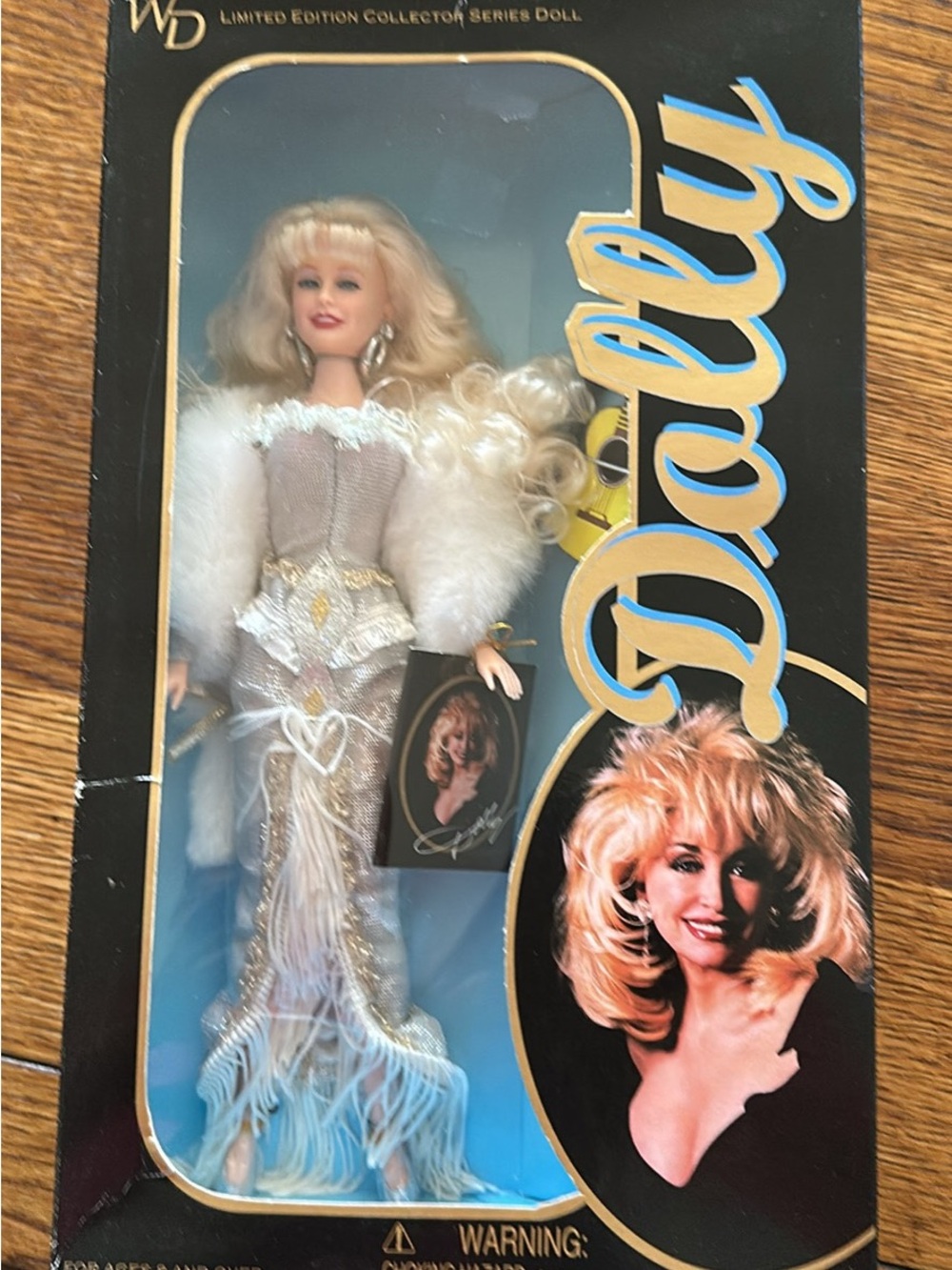 Collector Doll in White and Gold Fur-Trimmed Gown